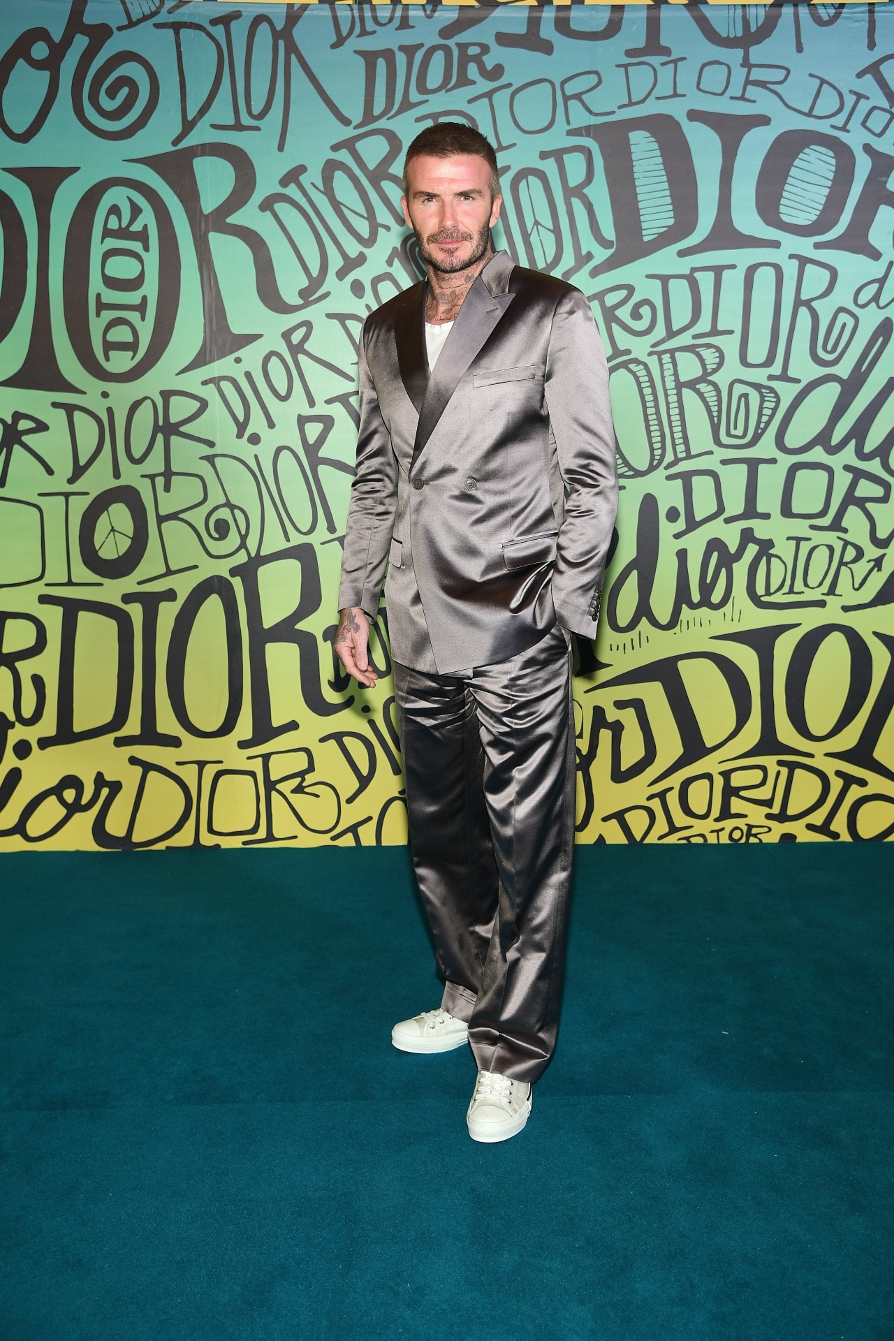 <h2>2020</h2><p>&nbsp;</p><p>As a dad, you still need to take risks sometimes. Beckham pulled off a shimmering grey suit with ease at this Dior show. No matter the texture or material, if it has a lapel, chances are it will look good on Beckham.&nbsp;</p>