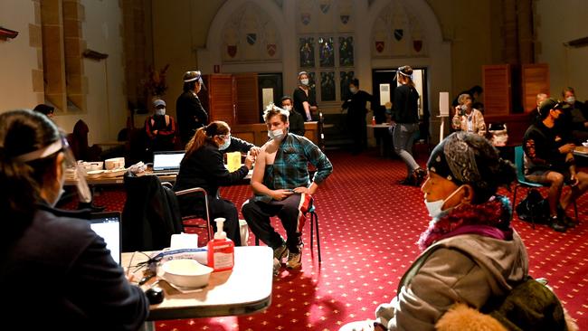 Rough sleepers and the homeless get vaccinations at The Rev. Bill Crews Foundation at Ashfield on Tuesday. Picture: Jeremy Piper