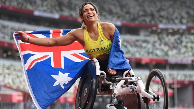 Australia’s Madison de Rozario celebrates winning the gold medal in the women's Marathon – T54 at the 2020 Paralympic Games in Tokyo. Picture: Getty Images