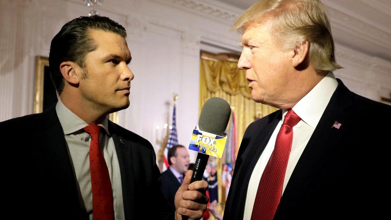 Pete Hegseth interviewing Donald Trump. Picture: Kevin Lamarque/Reuters