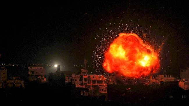 A fireball errupts during Isreali bombardment on Rafah, in the southern Gaza Strip. Picture: AFP.