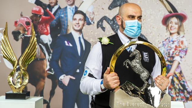 A security guard carries the Everest trophy during on race day at Royal Randwick Racecourse on October 17. Picture: Getty Images