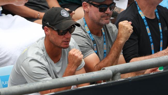 Lleyton Hewitt (left) watches his doubles partner from the Sydney International, Jordan Thompson, in his match against Andreas Seppi. Picture: AAP