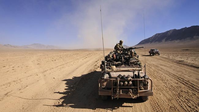 Australian Army soldiers travel through the desert in a long-range patrol vehicle during a Special Operations Task Group counter-insurgency operation in Uruzgan province, Afghanistan. Picture: Department of Defence