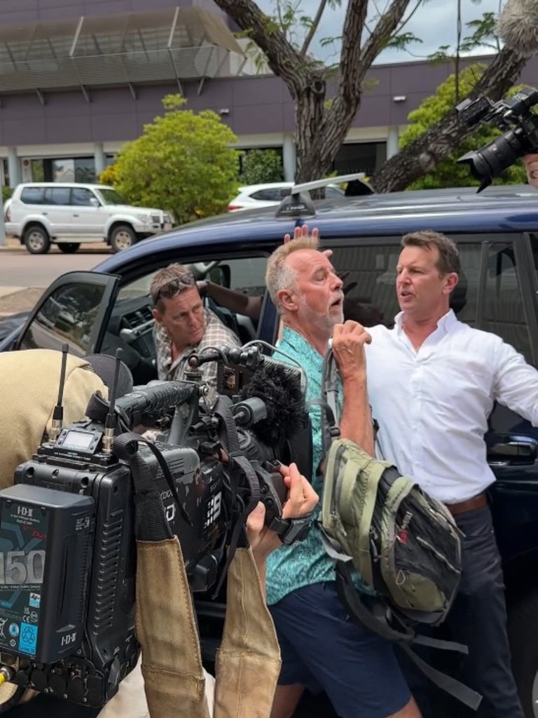 The confrontation kicked off after ex NT-cop Neil Mellon pleaded guilty in the Darwin Local Court to destroying evidence following a chopper crash that killed Netflix star Chris Willow Wilson.