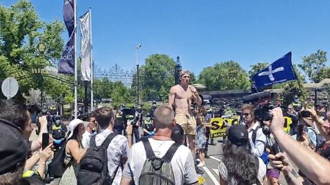 A huge crowd gathered outside the Melbourne Cup entrance and listened to this man speak. Picture: Facebook