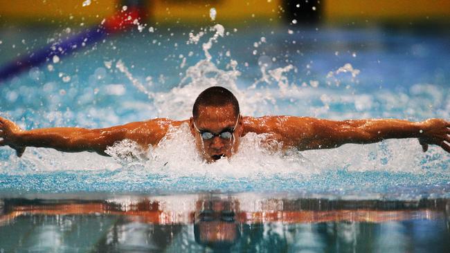 The champion butterflyer in full flight during his swimming career.