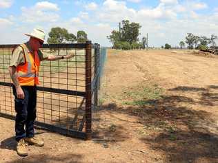 Rural Service Manager Karl Hempstead inspecting one of the recently installed fences. Picture: Balonne Shire Council