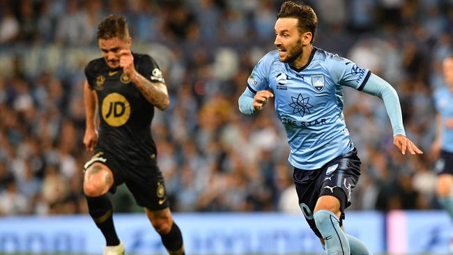 Sydney FC playmaker Milos Ninkovic, right, in action against the Wanderers at the SCG on Saturday night. Picture: AAP
