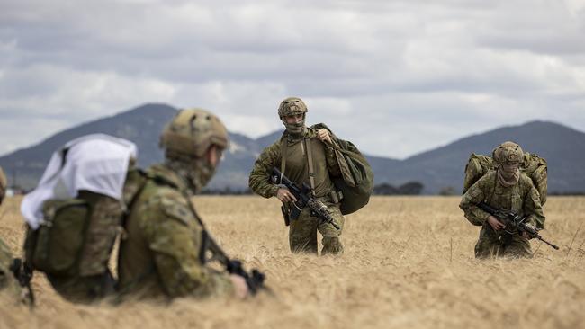 Australian Army special operations force soldiers from the 1st Commando Regiment rendezvous in a wheat field near the You Yangs after parachuting from a Royal Australian Air Force C-130J Hercules aircraft as part Exercise Star Leopard on Saturday, 20 November 2021 Picture: Supplied