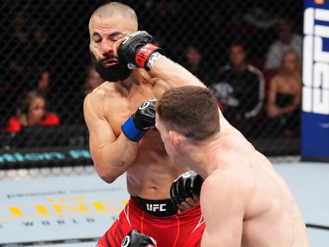 Mullarkey lands a right hand on John Makdessi. PIcture: Chris Unger/Zuffa/Getty Images