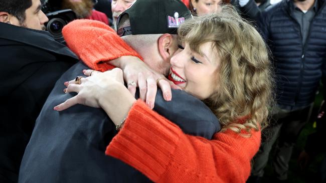 Taylor Swift celebrates with Travis Kelce. Photo by Rob Carr/Getty Images.