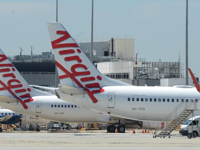 MELBOURNE, AUSTRALIA - NewsWire Photos NOVEMBER 22, 2021: Virgin planes parked at Melbourne Airport. Picture: NCA NewsWire / Andrew Henshaw