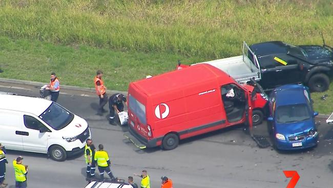 Emergency services at the scene of a four-car pileup in Logan. PHOTOS: 7NEWS