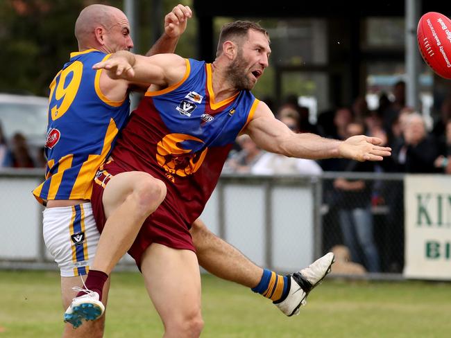 Travis Cloke had a good battle with Somerville captain Ben Sedgwick. 