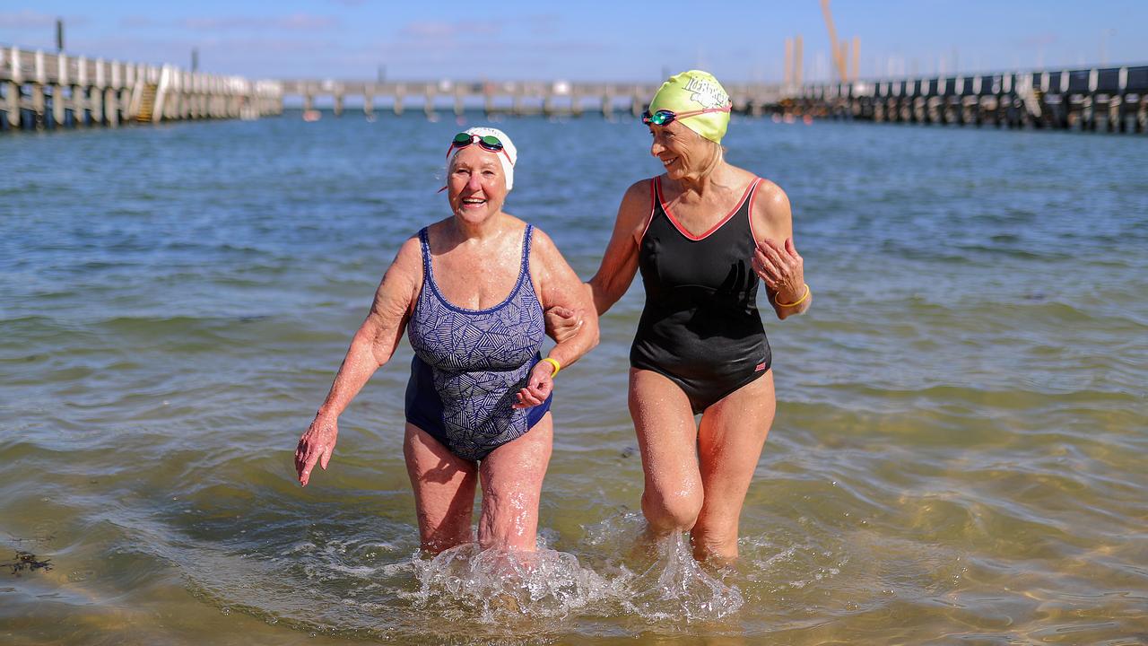 The Brighton Icebergers are a shining example of older people keeping fit to prevent serious health issues, with Jan Tozer (left) and Helen Blake (right) taking a dip at Brighton. Picture: Alex Coppel