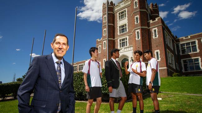 Melbourne High School principal Tony Mordini with year 10 students Mark, Jake, Ravine and Kunal. Picture: Mark Stewart