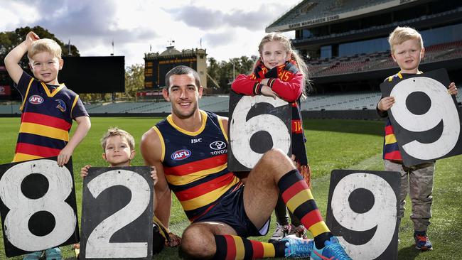 Adelaide Crows captain Taylor Walker with junior members Henry Bannister, 4, Zander James, 4, Matilda Selth, 5, and Max Poole, 4. Picture SARAH REED