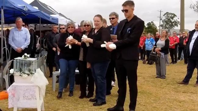 Three white doves were released at the end of the service in the park. Pictures: Generation Funerals livestream