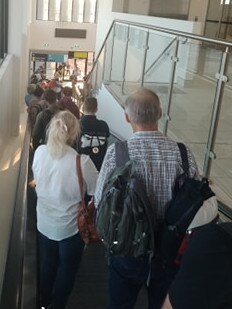 Passengers arriving into Darwin via Qantas flight QF 836 on Wednesday July 1, 2020, were pictured crammed in the hallway while awaiting processing. Picture: Supplied