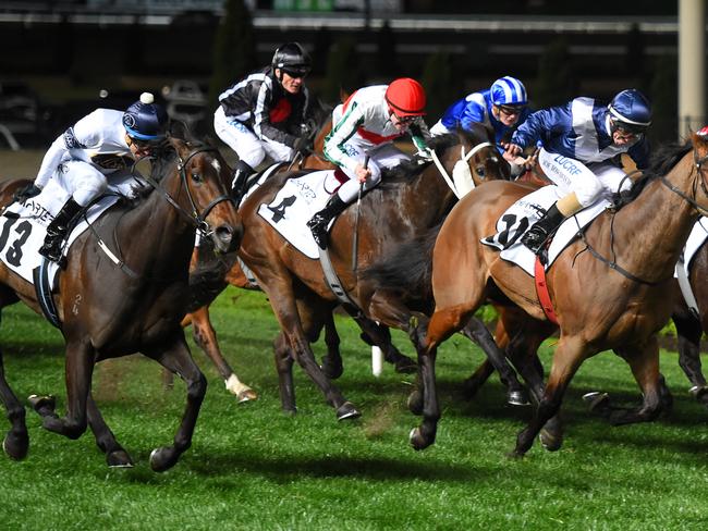 Kerrin McEvoy and She Will Reign (left) arrive late to take out Moir Stakes. Picture: Getty Images