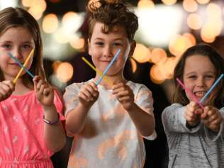 The South Melbourne Market banned straws from December 1, 2018. Arabella, 7, Hugo, 7, and Charley, 6, support the ban. Picture: Penny Stephens