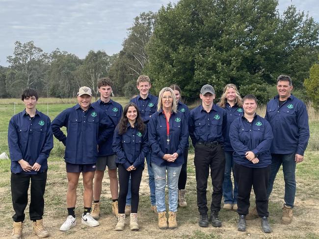 Lisa Mack (centre) and Brendan Ricci (right) with students from Yea High School.