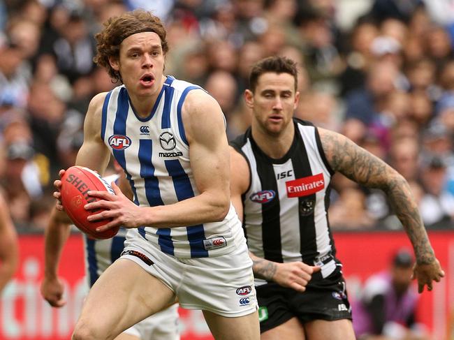 Ben Brown playing for the Kangaroos in a game that runs in the family, with grandfather Jim Manson a footballer who played 200 games at Glenorchy Football Club and uncle, Collingwood player James Manson.