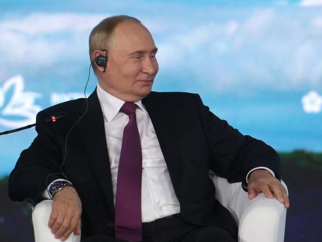 In this pool photograph distributed by the Russian state agency Sputnik, Russia's President Vladimir Putin attends a plenary session of the Eastern Economic Forum in Vladivostok on September 5, 2024. (Photo by Vyacheslav PROKOFYEV / POOL / AFP)