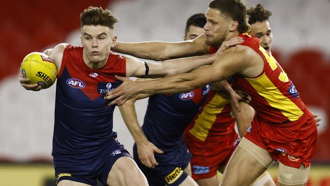 Bayley Fritsch breaks a tackle attempt from Jy Farrar at Marvel Stadium. Picture: Getty Images