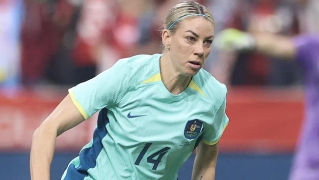 VANCOUVER, BRITISH COLUMBIA - DECEMBER 05: Alanna Kennedy #14 of Australia controls the ball during the first half against Canada at BC Place on December 05, 2023 in Vancouver, British Columbia. (Photo by Craig Mitchelldyer/Getty Images for Football Australia)