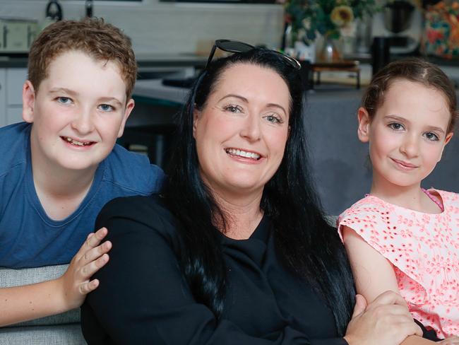 Elisha Salkeld with daughter Sophie and son Hunter 12 happy to have found a better health insurance option .Picture: Glenn Campbell