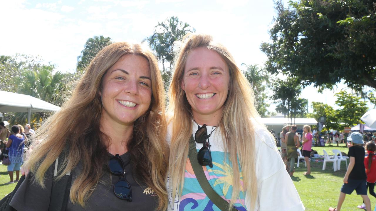 Izzy Wakefield and Annie Davies enjoy the day at Cairns Ecofiesta, 2024. Photo: Catherine Duffy