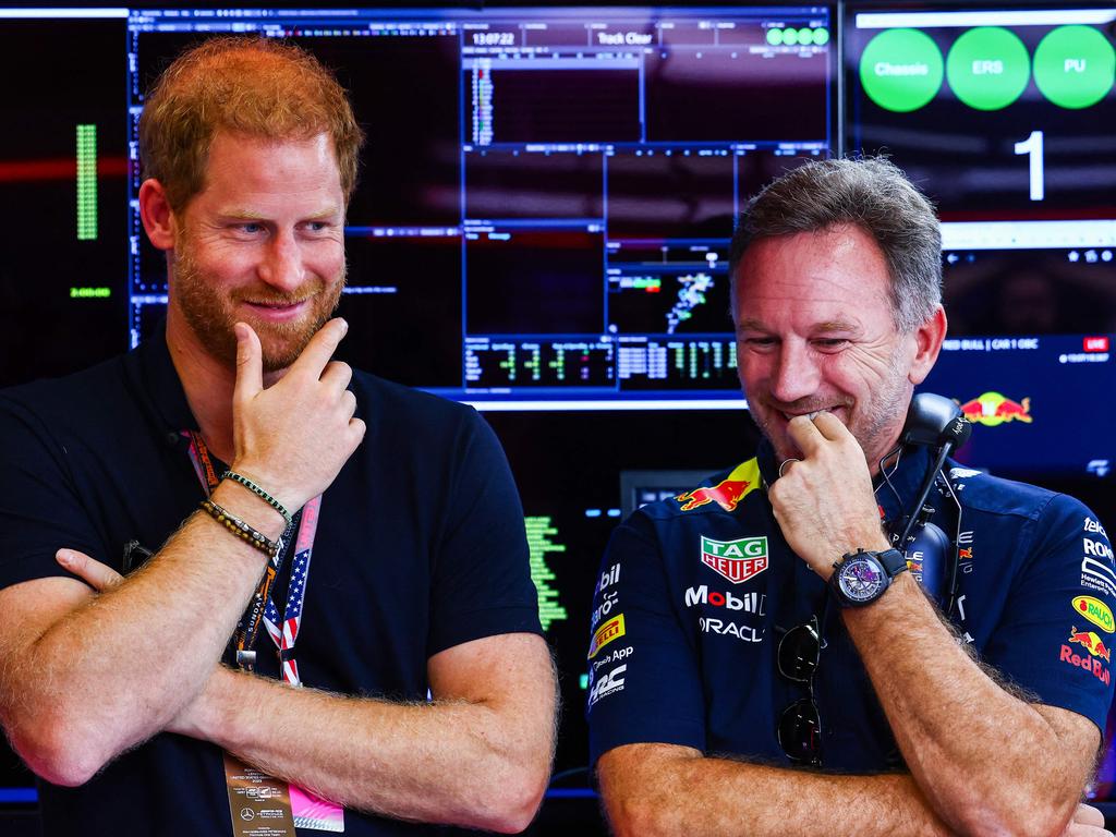 Christian Horner, who is married to former Spice Girl Geri Halliwell, with Prince Harry in the garage. Picture: Getty Images