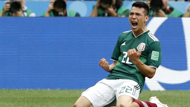 Mexico's Hirving Lozano celebrates scoring his side's opening goal.
