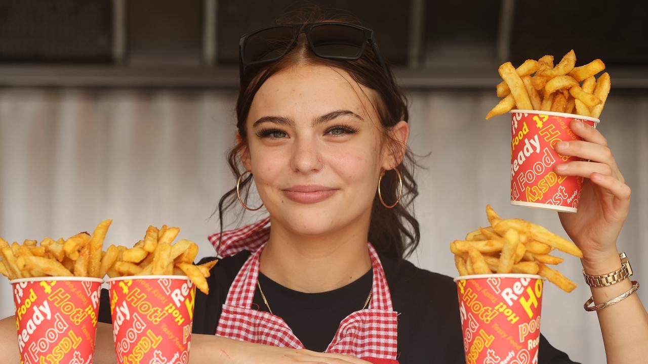 Ebony Sawbridgworth with $8 bucket of chips at food van at the Royal Geelong Show. Picture: Alison Wynd