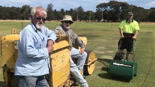 Mawson Lakes Cricket Club volunteers Stephen Morton, Michael Charles and Wayne Collins on their oval which has been transferred from UniSA to Renewal SA for development. Picture: Mary Crouch