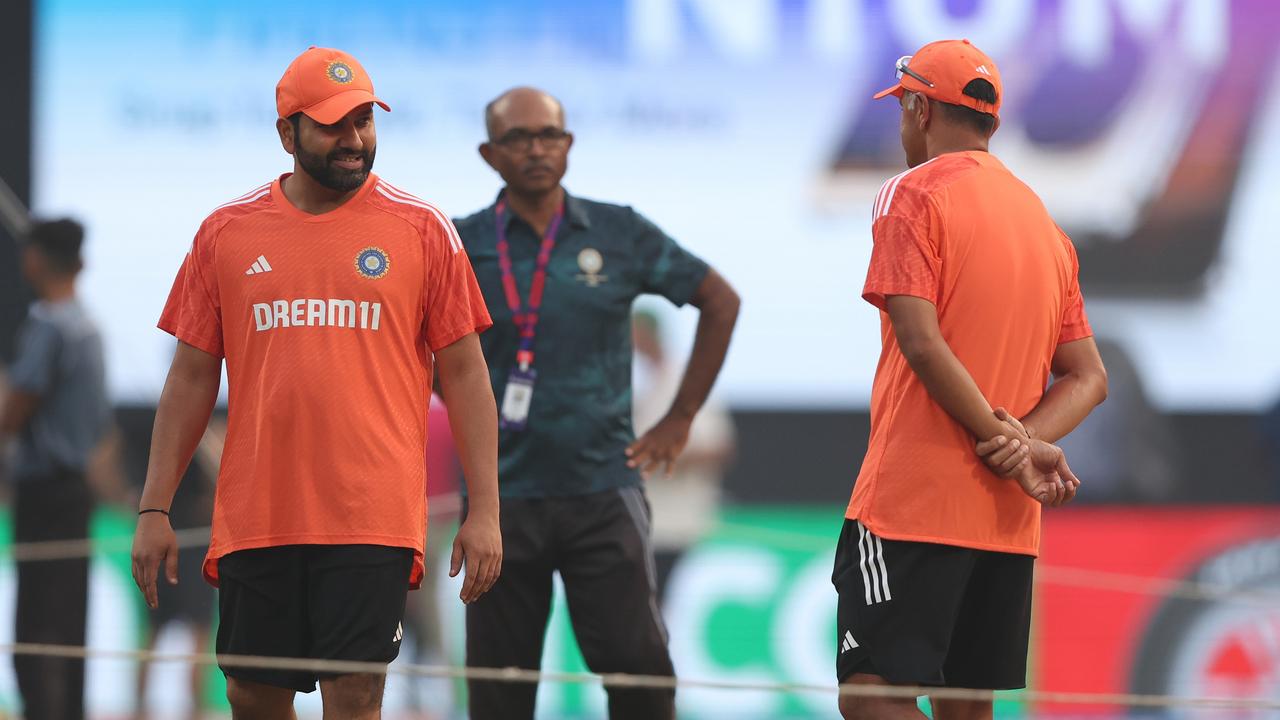 Rohit Sharma of India and coach Rahul Dravid inspect the pitch, that is expected to be slow. (Photo by Robert Cianflone/Getty Images)