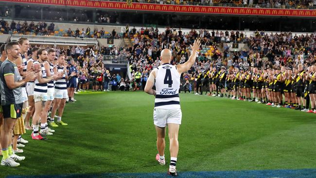 Gary Ablett walks off the ground after his last AFL game as Geelong and Richmond players form a guard of honour. Picture: Sarah Reed