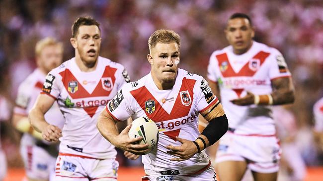 WOLLONGONG, AUSTRALIA - APRIL 13: Jack de Belin of the Dragons runs the ball during the round six NRL match between the St George Illawarra Dragons and the Cronulla Sharks at WIN Stadium on April 13, 2018 in Wollongong, Australia. (Photo by Brett Hemmings/Getty Images)