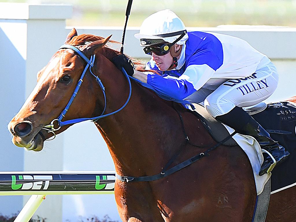 Jockey Les Tilley rides Spurcraft to victory in race 3, the Class 6 Handicap, during the Variety The Childrens Charity Teddy Bears' Picnic at the Races at Doomben Racecourse in Brisbane, Saturday, July 28, 2018. (AAP Image/Albert Perez) NO ARCHIVING, EDITORIAL USE ONLY