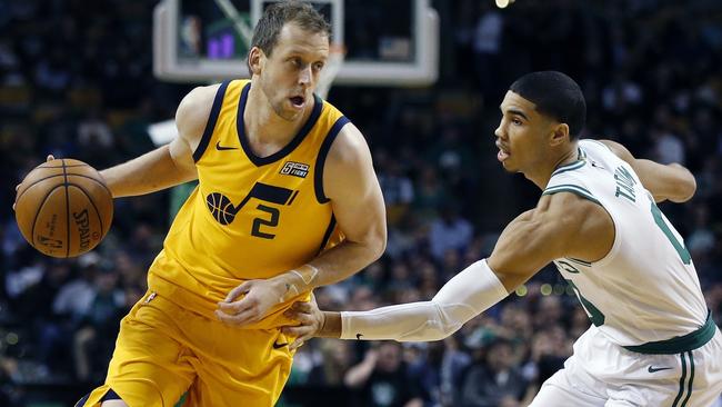 Ingles rocks Utah’s delicious ‘Statement’ jersey in a clash with the Boston Celtics and boom rookie Jayson Tatum. Picture: AP