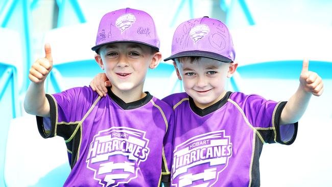 Brothers Elliott, 7, and Lincoln McGee, 6, of Howrah watch the Hobart Hurricanes’ open training session at Blundstone Arena. Picture: ZAK SIMMONDS