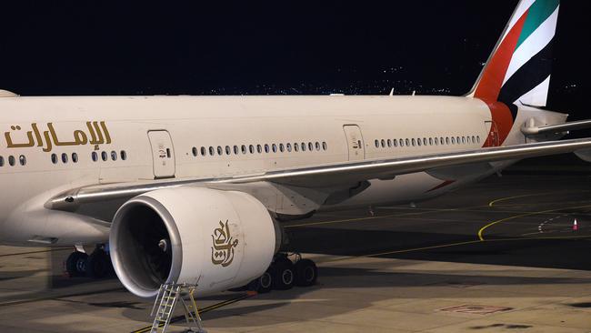 Out of action. The Emirates’ Boeing 777 at Adelaide Airport after being diverted en route from Dubai to Brisbane. Picture: Roger Wyman.