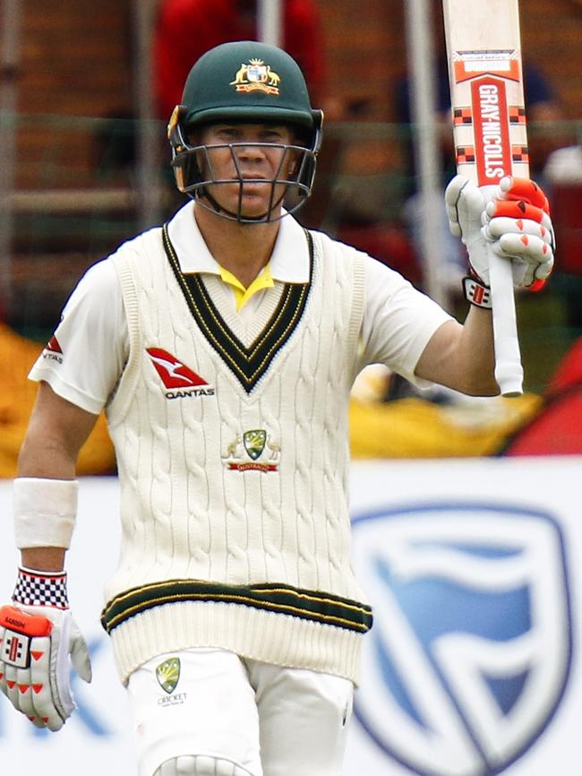 Warner raises his bat for 50. Pic: AP