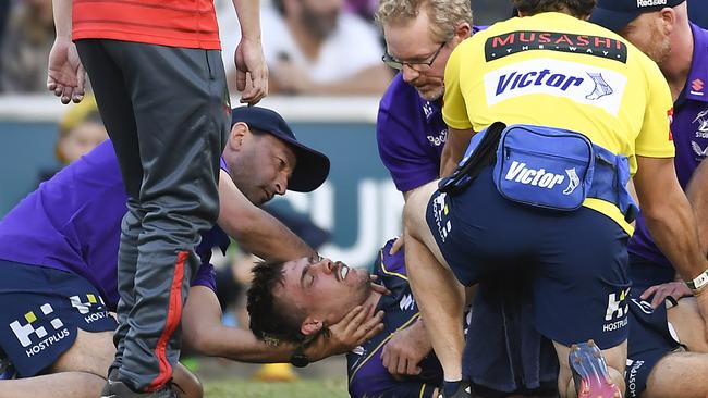 Ryan Papenhuyzen of the Storm receives medical attention after a heavy shot to his head in Round 10. Picture: Albert Perez/Getty Images