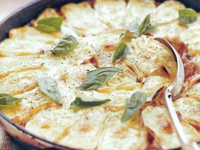 This chicken bake includes tomatoes and brie.