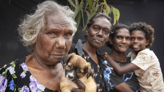 Dhopiya Gurruwiwi (with Tinkerbell), Selma Raliny Gurruwiwi, Rachael Dhurrkay and Dorothy Garrawurra in Gulkula. Picture: Melanie Faith Dove