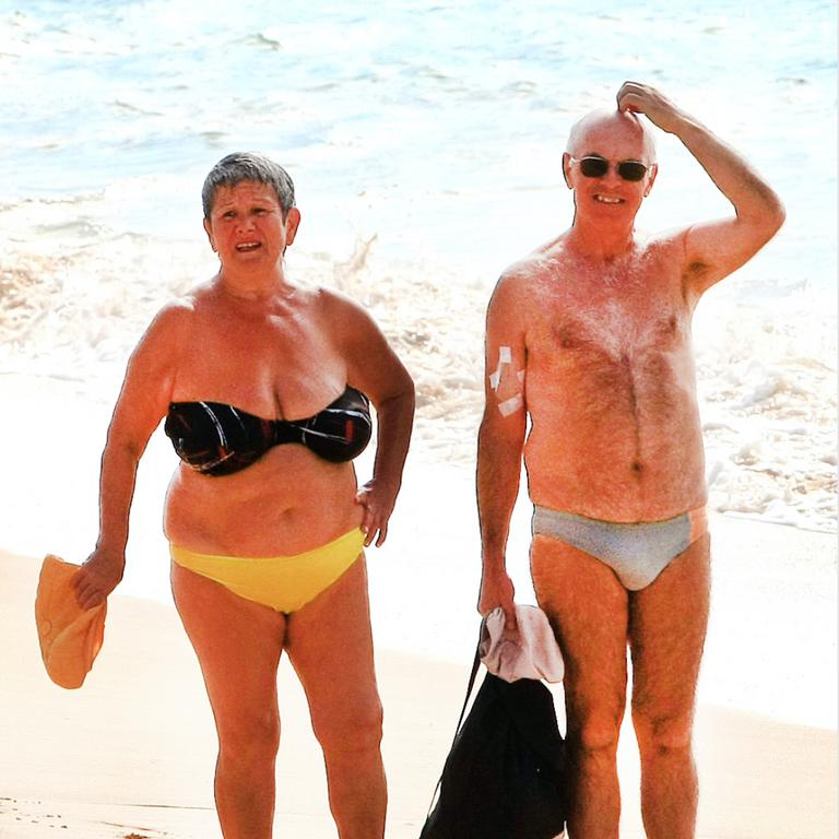 Betty and Harold Thompson enjoy a day at Coolangatta Beach while the weather holds out. Photo: Scott Powick Newscorp