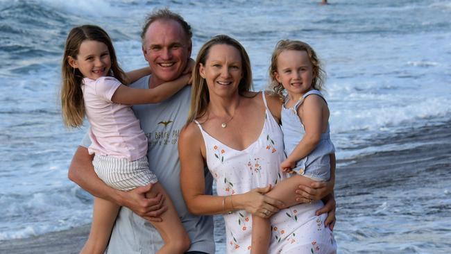 Andrew Stark with wife Belinda and kids Chloe, 4, and Lily, 8.